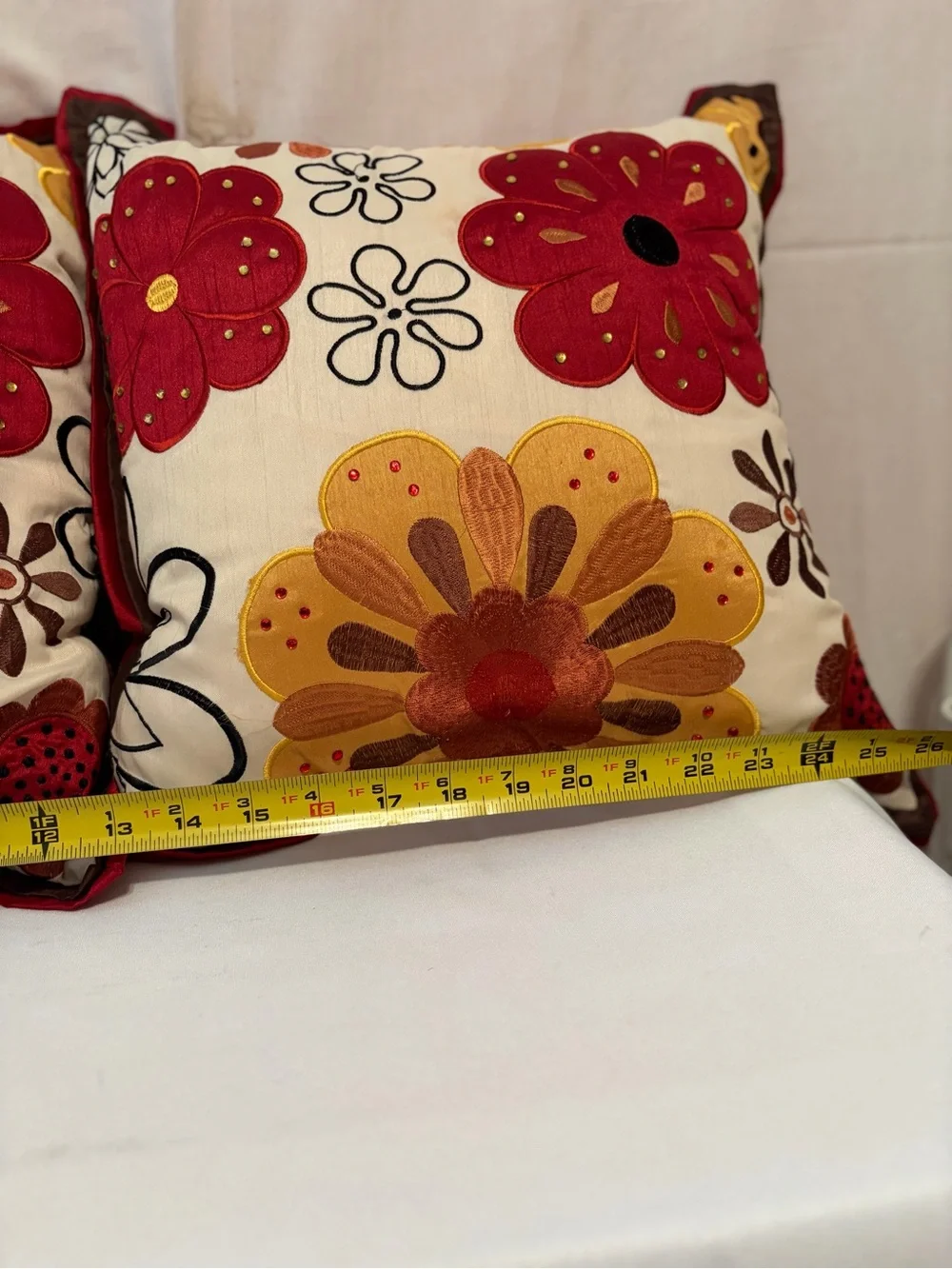Pier 1 Imports pillows vibrant floral embroidery in red and gold